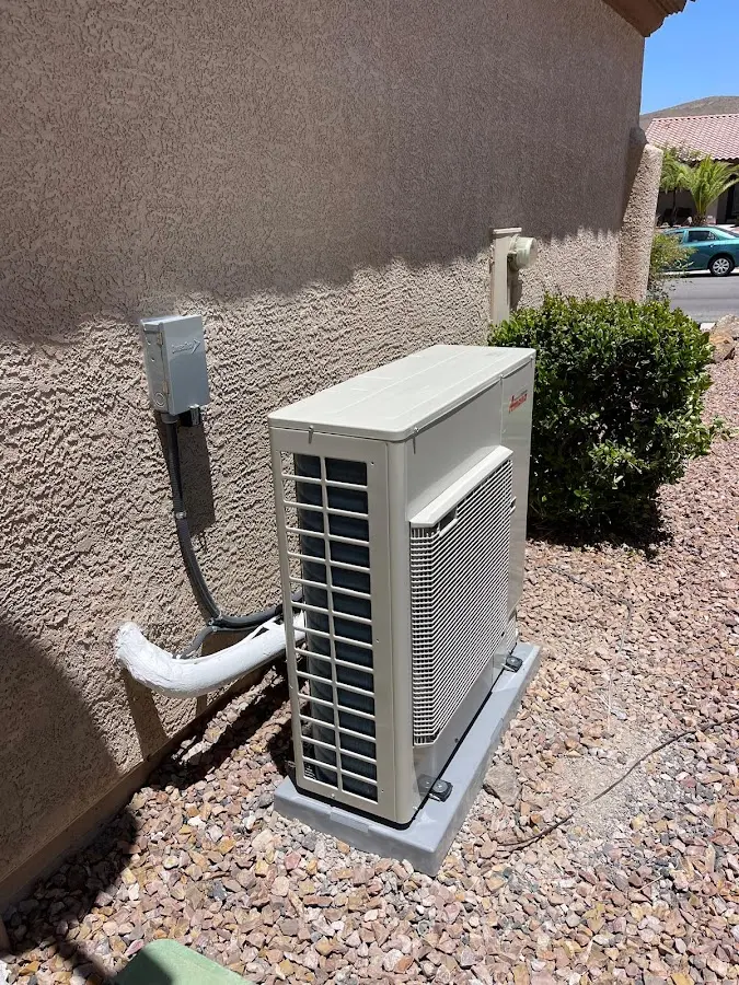 Residential air conditioning condenser unit in Ione